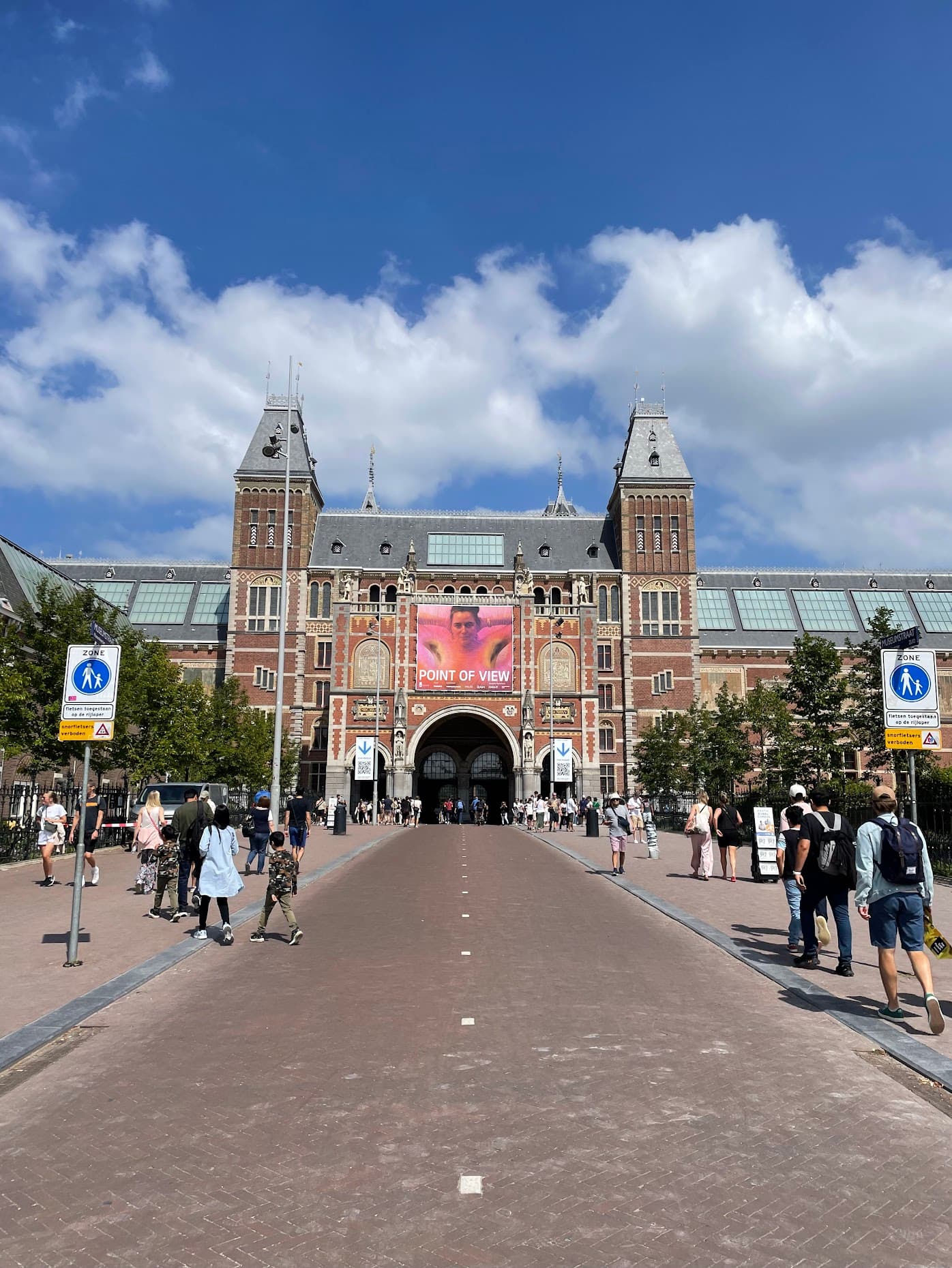 The brick towers of the Rijksmuseum at the end of Museumstraat on a sunny day in Amsterdam
